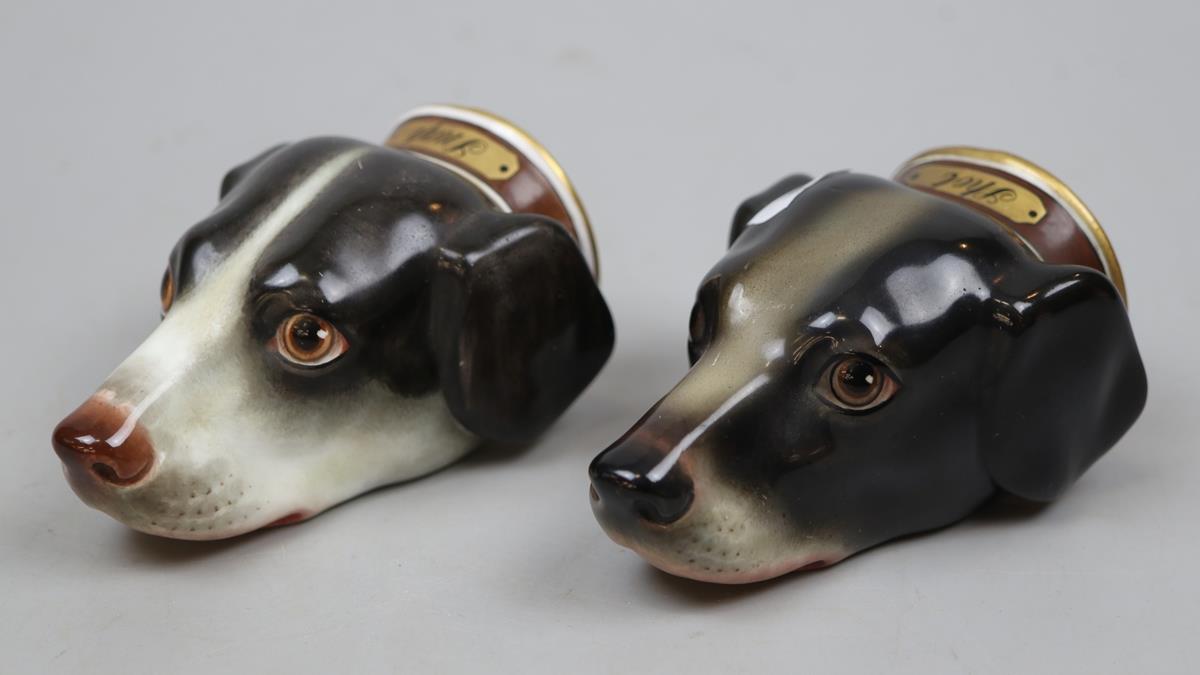 Pair of ceramic stirrup cups in the form of dogs
