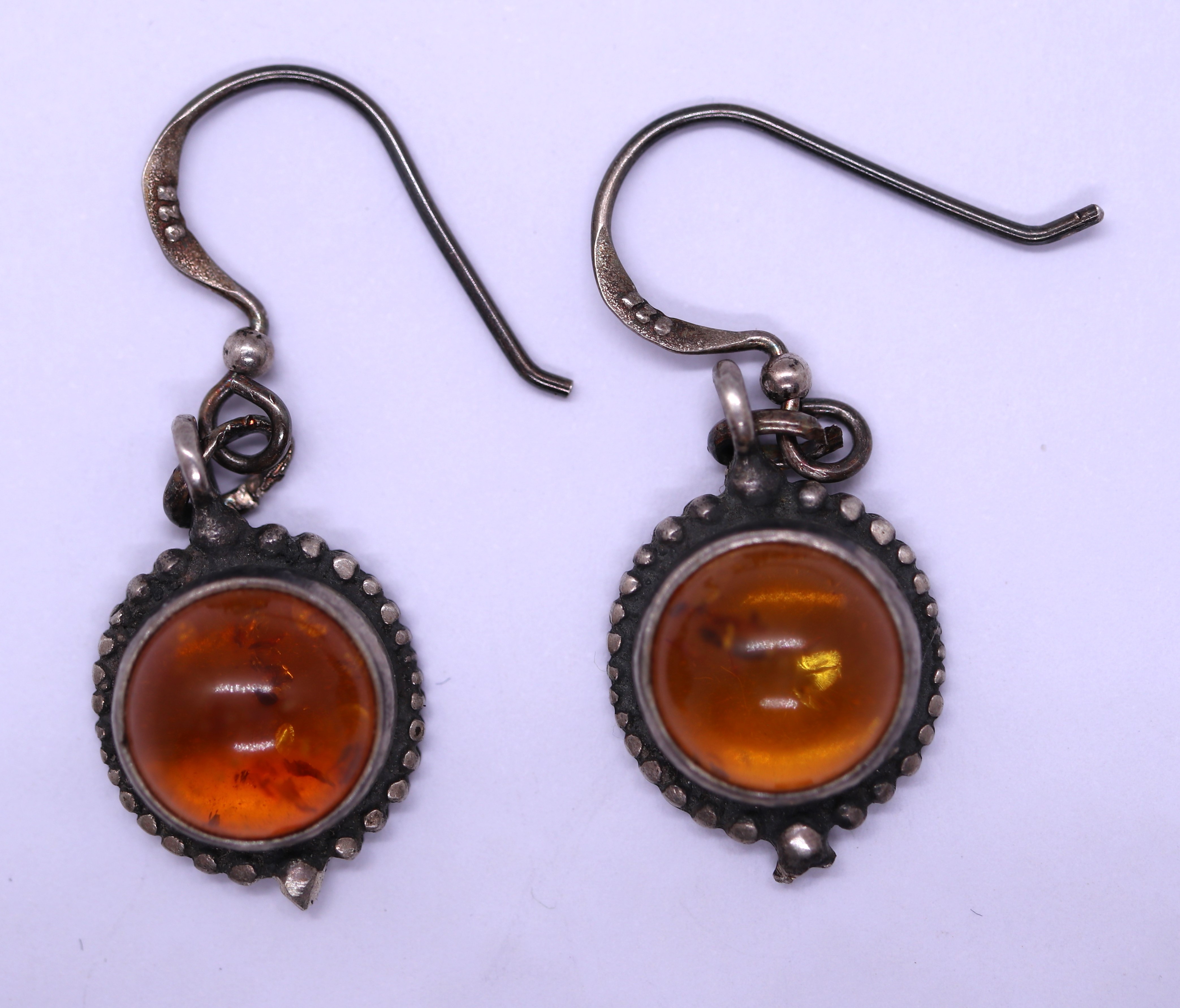 Pair of silver and amber set earrings together with ring - Image 5 of 6