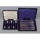 Cased set silver handled butter knives together with cased Hukin & Heath silver teaspoons
