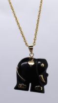 14ct gold elephant pendant together with a 9ct gold chain