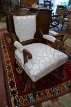Inlaid upholstered armchair on casters