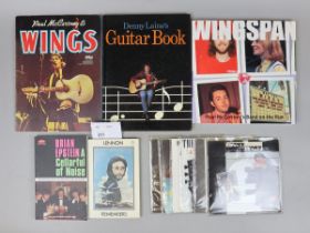 Beatles memorabilia - collection of books together with 7'' singles