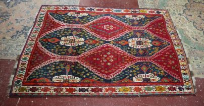 Large red patterned rug - Approx 257cm x 178cm