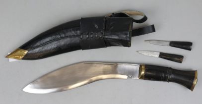Kukri in sheath together with 2 smaller knives