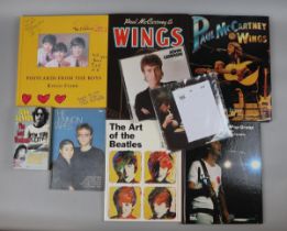 Beatles memorabilia - collection of books together with a couple of 7'' singles