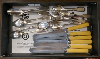 Set of knives together with 2 sets of white metal spoons