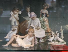 Collection of figurines to include Nao, Lladro etc