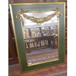 Gilt framed mirror adorned with gilt swag - Approx size: 72cm x 97cm