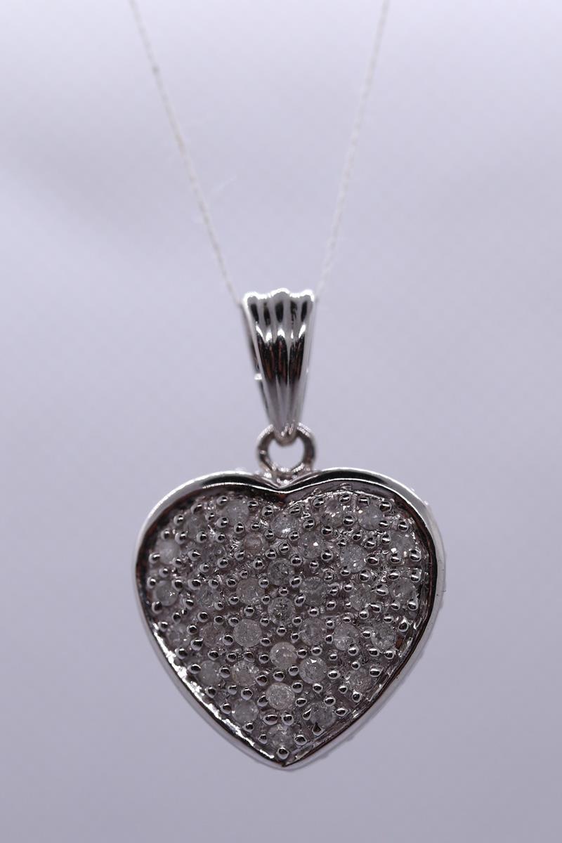 White gold diamond set heart pendant