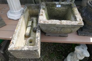 Old square stone planter together with another