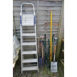 Good collection of garden tools together with a pair of steps