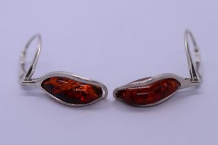 Pair of silver drop earrings
