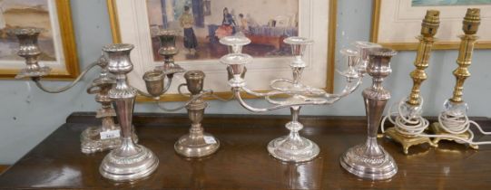 2 silverplate candelabras, 1 silver on copper candelabra, pair of candlesticks together with a