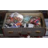 Large collection of costume jewellery in suitcase