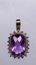 9ct gold amethyst & diamond set pendent