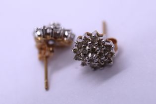 Pair of 9ct gold diamond cluster earrings