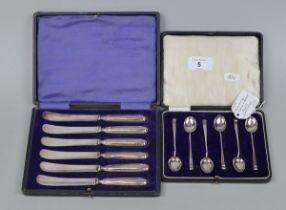 Cased set silver handled butter knives together with cased Hukin & Heath silver teaspoons