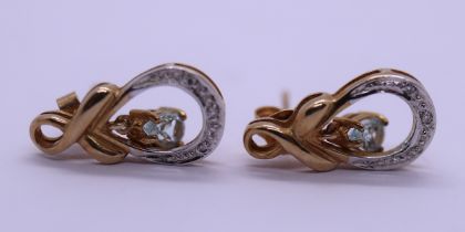 Pair of 9ct gold diamond & aquamarine set earrings