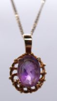 9ct gold amethyst pendent on 9ct gold chain