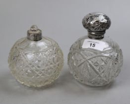 Hallmarked silver topped scent bottle together with another