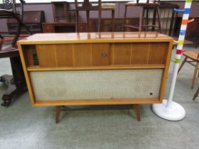 A mid-20th century Pye media cabinet containing a Pye radio along with a Garrard turntable