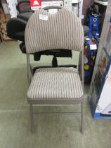 +VAT A metal folding chair with fabric seat and back cushions