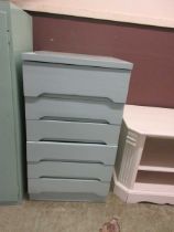 A mid-20th century style blue painted chest of six drawers