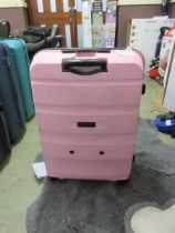 +VAT A pink American Tourister suitcase No apparent damage.