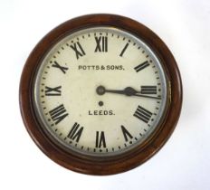 A Victorian oak cased wall clock, with brass single fusee movement, the enamel dial inscribed for '