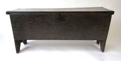 A 17th century oak six plank coffer, with chip carved edges, the front edges with plane moulded