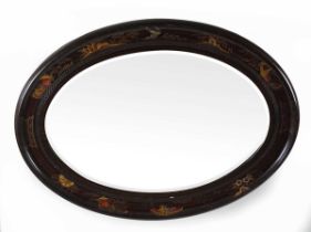 An early 20th century chinoiserie mirror, of oval form with bevelled edge glass, 68.5cm x 93cm