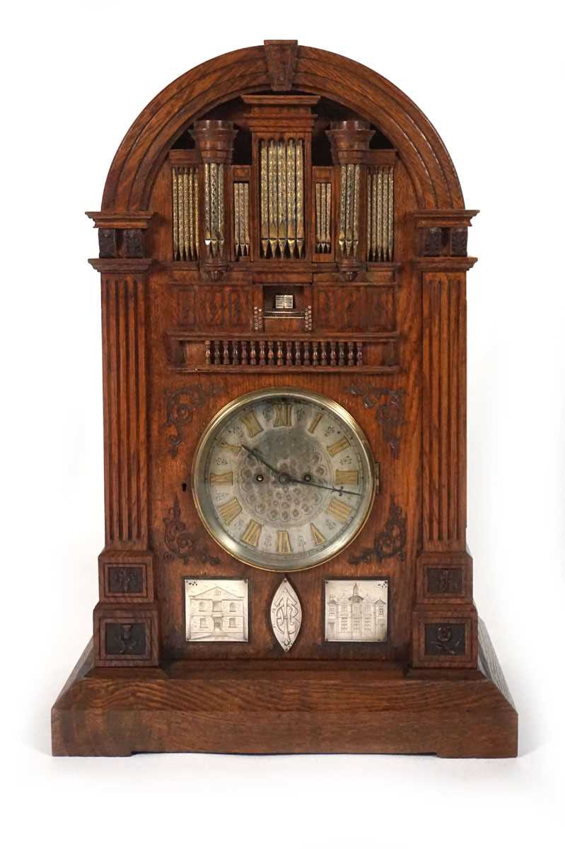 A late 19th century oak 'Church Organ' mantel clock. The top modelled as a pipe organ above reeded - Image 2 of 16