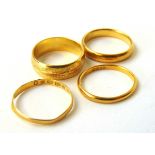 Four 22ct gold wedding bands. Approx. weight 13.5g