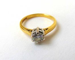 An 18ct gold diamond solitaire ring, the round brilliant stone approximately 0.45ct. Size H 1/2.