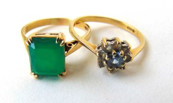 A 9ct gold synthetic emerald dress ring together with a 9ct gold CZ dress ring. Approx. weight 4.