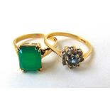 A 9ct gold synthetic emerald dress ring together with a 9ct gold CZ dress ring. Approx. weight 4.