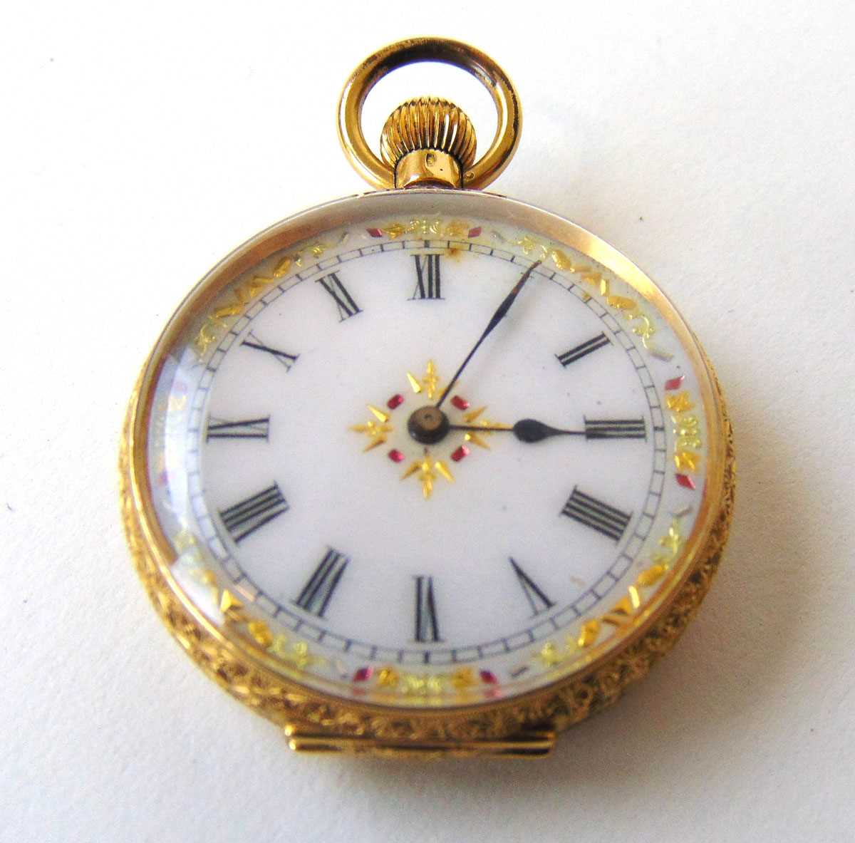 A late 19th/early 20th century yellow metal fob watch marked '18K', the enamelled dial with red