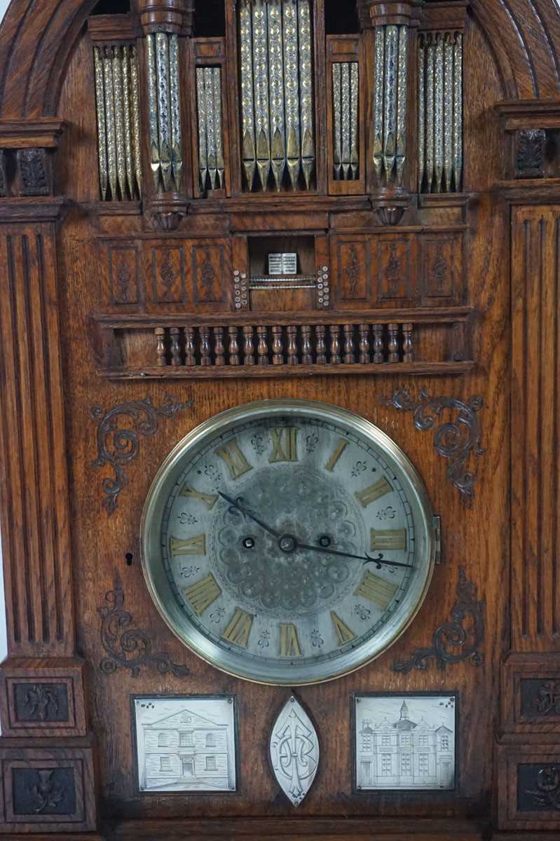 A late 19th century oak 'Church Organ' mantel clock. The top modelled as a pipe organ above reeded - Image 5 of 16