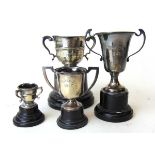 Four small silver trophies. Various hallmarks. Approx. weight 142g