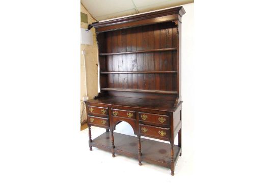 An early 20thn century reproduction oak Welsh dresser, the plate rack with boarded back, above the - Image 4 of 4