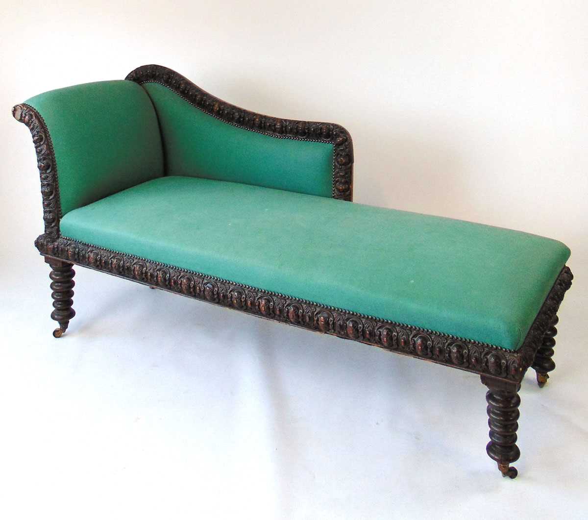 A 19th century oak chaise longue, the frame with a continuous band of oval foliate carved bosses, - Image 3 of 4