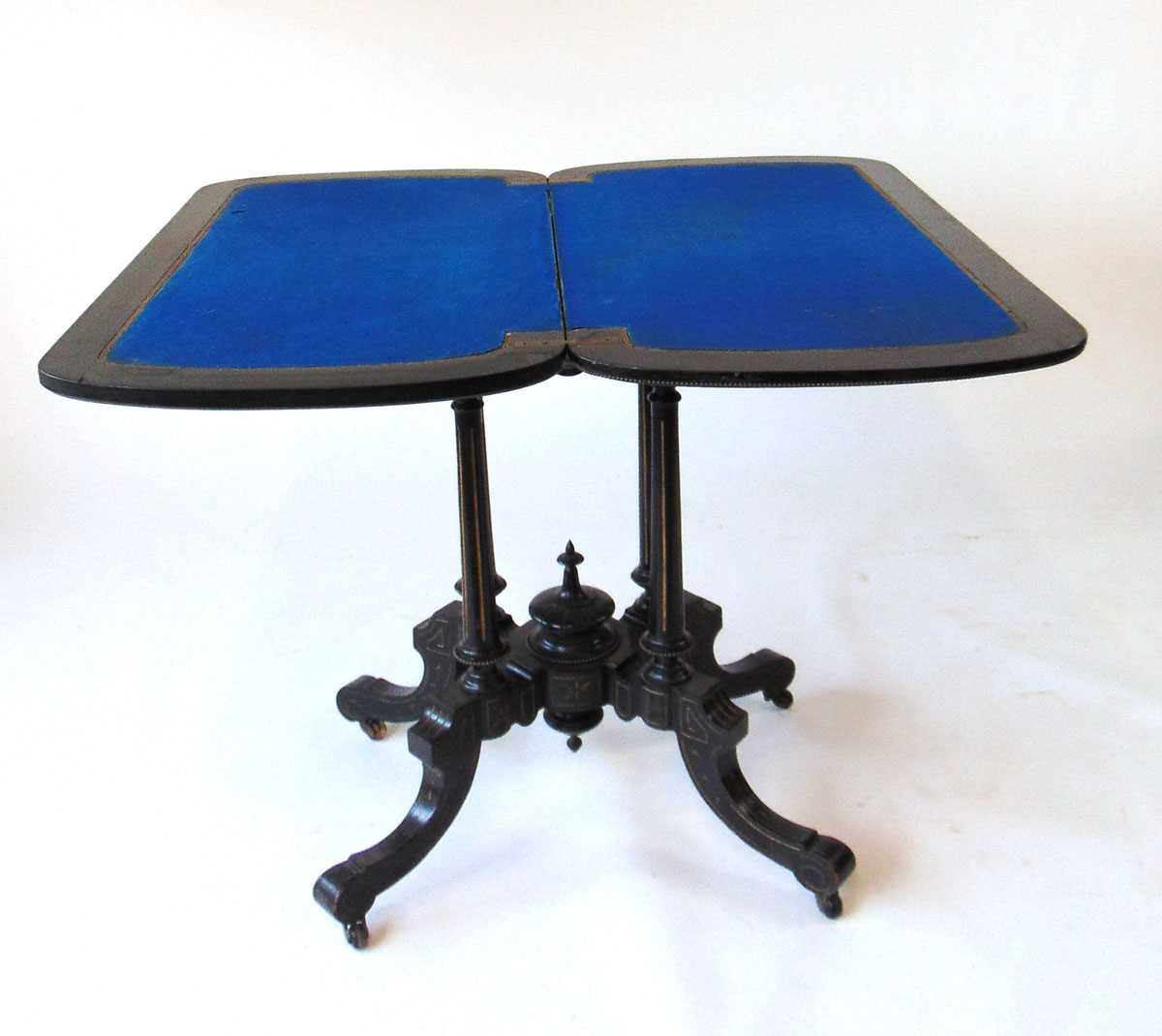 An Aesthetic period ebony and amboyna veneered card table, the top with shallow carved bellflower - Image 5 of 7