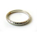 A white metal engraved band marked 'Plat'. Size M. Approx. weight 3.6g