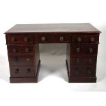 A 19th century mahogany twin pedestal desk, stamped for Heal & Son, London, with three frieze