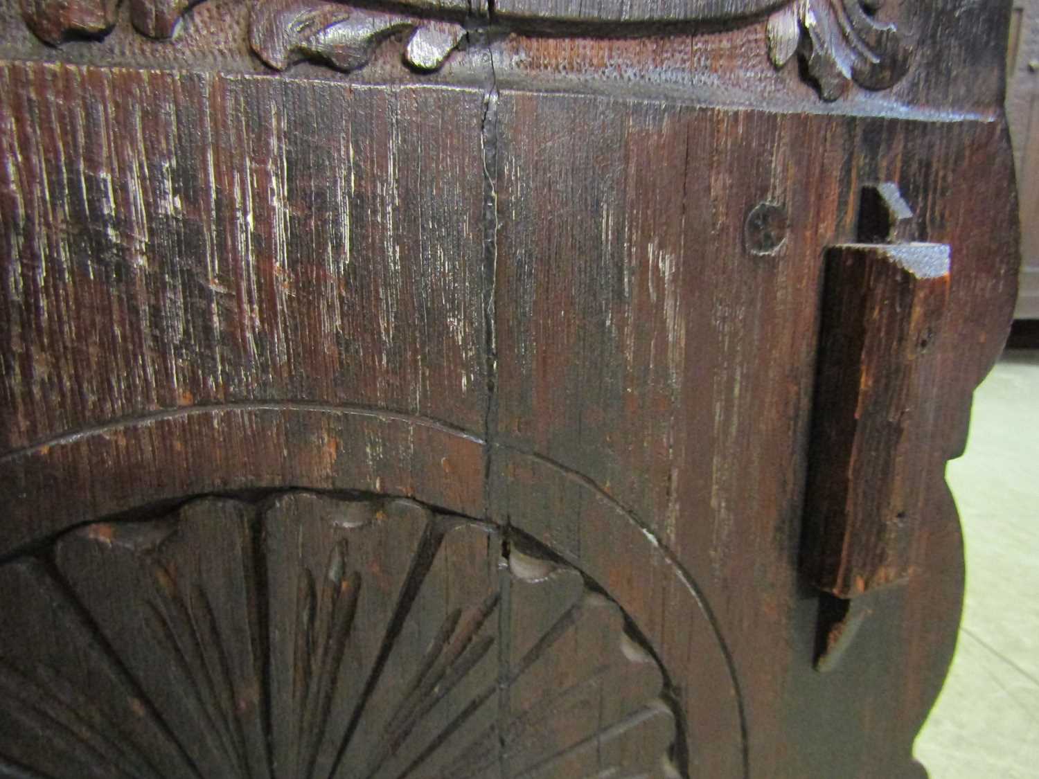 A late Victorian carved and ebonised oak purdonium/seat, decorated with carved masks, foliate - Image 10 of 14