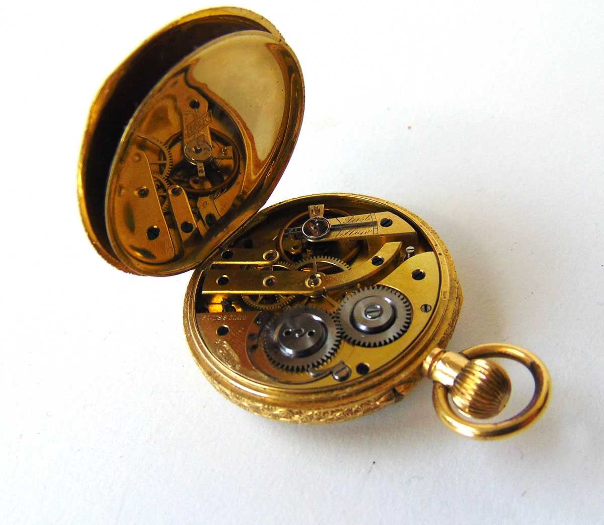 A late 19th/early 20th century yellow metal fob watch marked '18K', the enamelled dial with red - Image 2 of 2