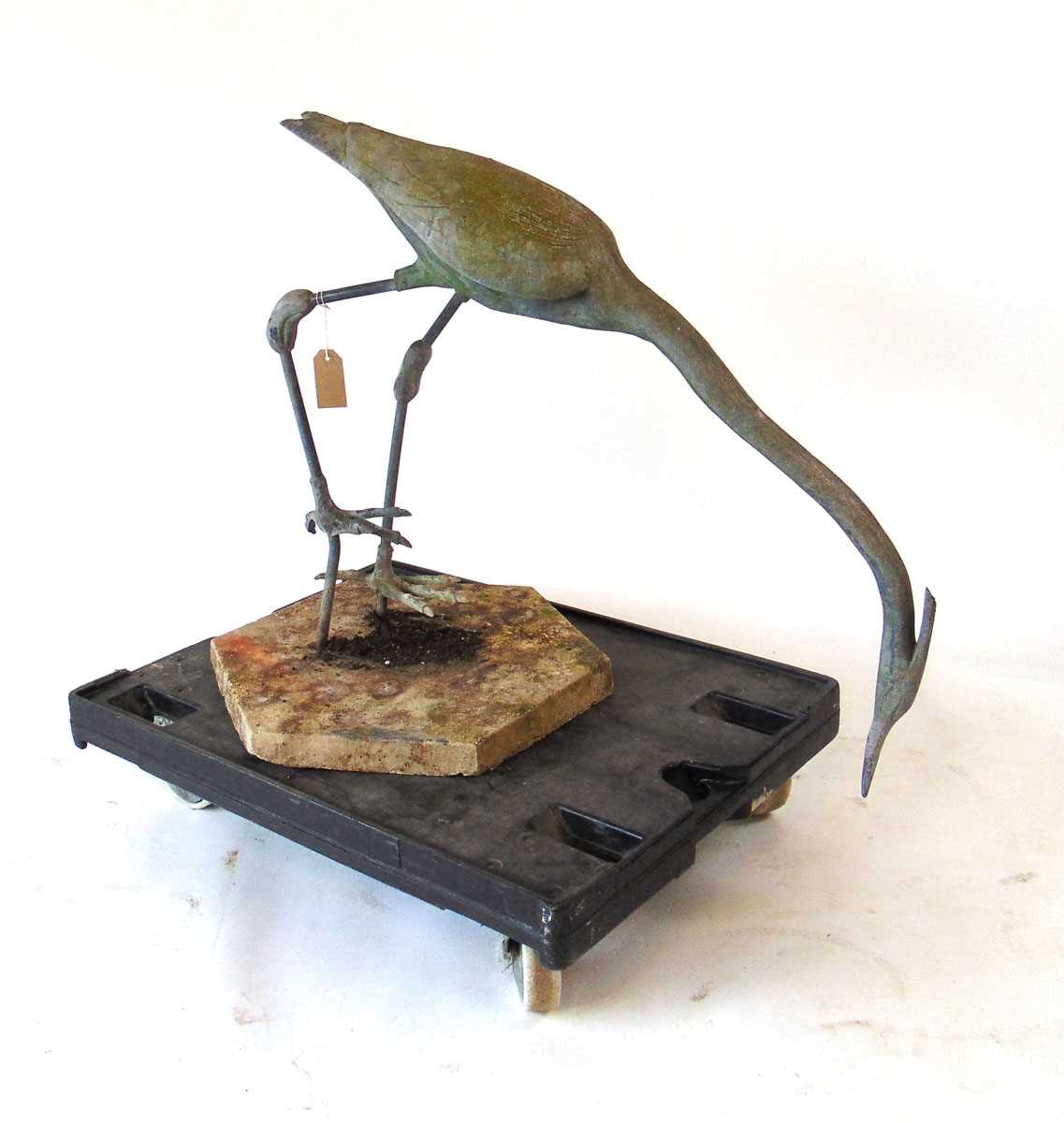 A life size lead Heron garden ornament, modelled facing downwards, on a concrete base, 88cm wide , - Image 4 of 4