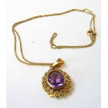 A 9ct gold and amethyst pendant on chain. Approx. weight 3.7g