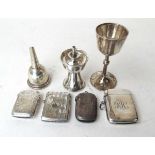 Four sterling silver vesta cases, a silver cigar lighter, a silver funnel and a small silver goblet,