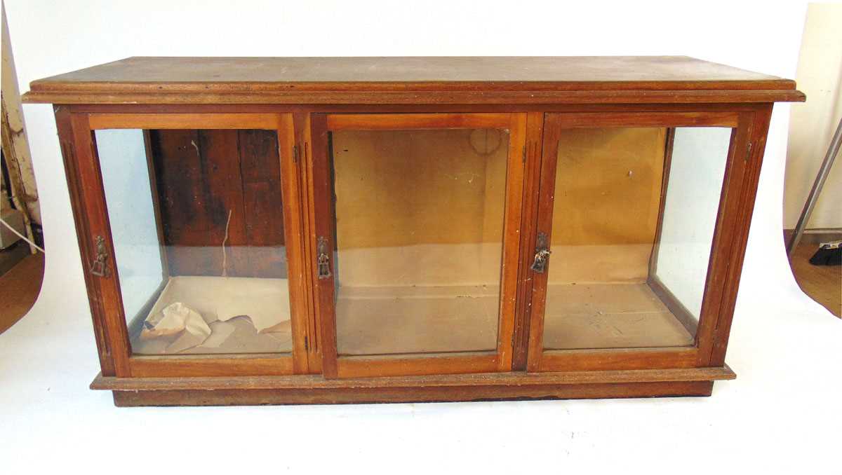 A Victorian mahogany shop display counter, the top with applied moulded edge above three glazed - Image 2 of 3